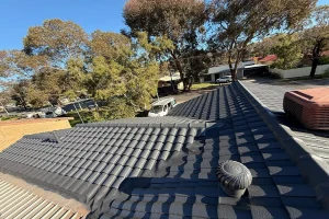 Tiled roof with whirlybird vent